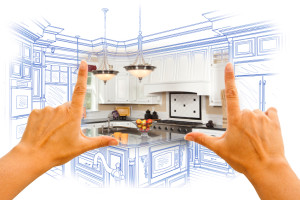 Female Hands Framing Custom Kitchen Design Drawing and Photo Combination.